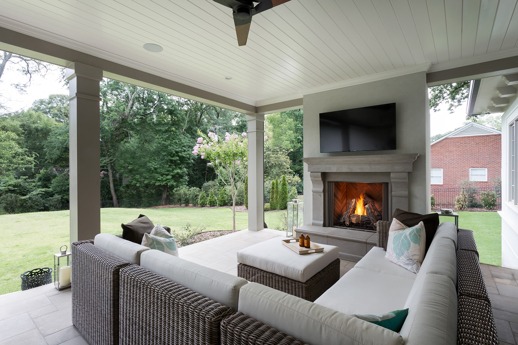 Majestic Courtyard 42 gas fireplace on covered outdoor patio with herringbone firebox