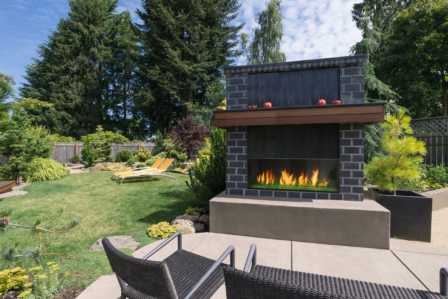 Majestic Lanai 48 outdoor fireplace in garden patio setting