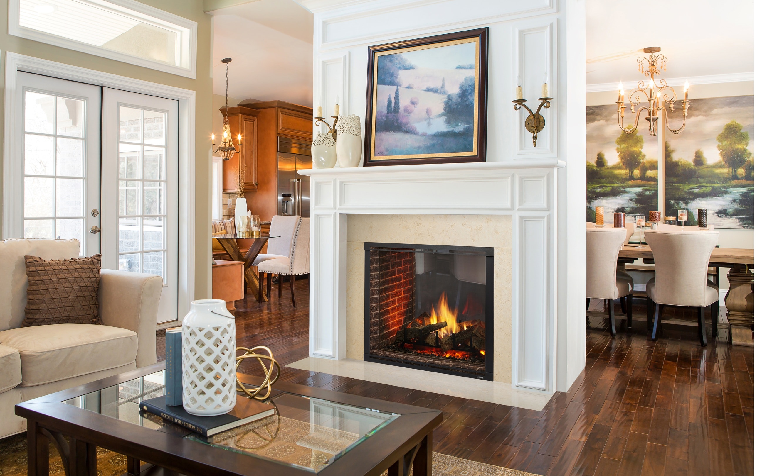 Majestic Marquis II 42ST gas fireplace with white mantel surround open to dining room